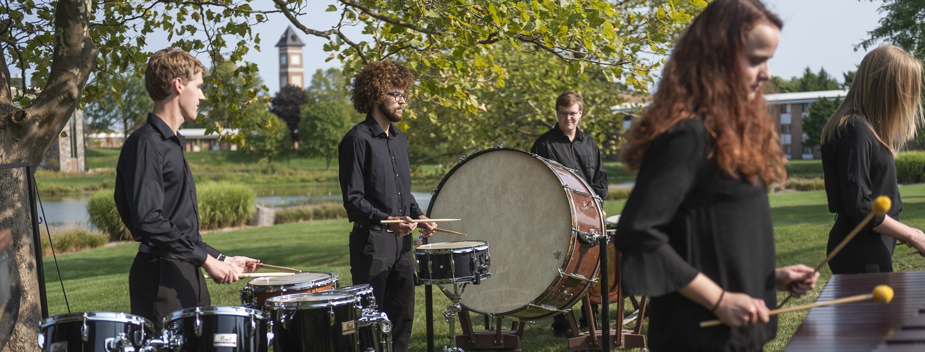 Percussion ensemble practicing outside on the campus of Cornerstone University