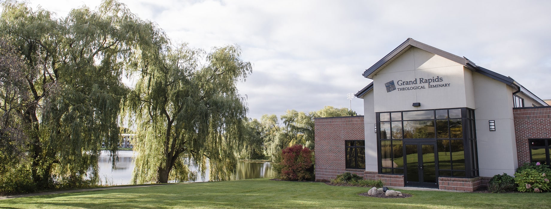 Grand Rapids Theological Seminary academic building and faculty offices located next to the pond on the campus of Cornerstone University